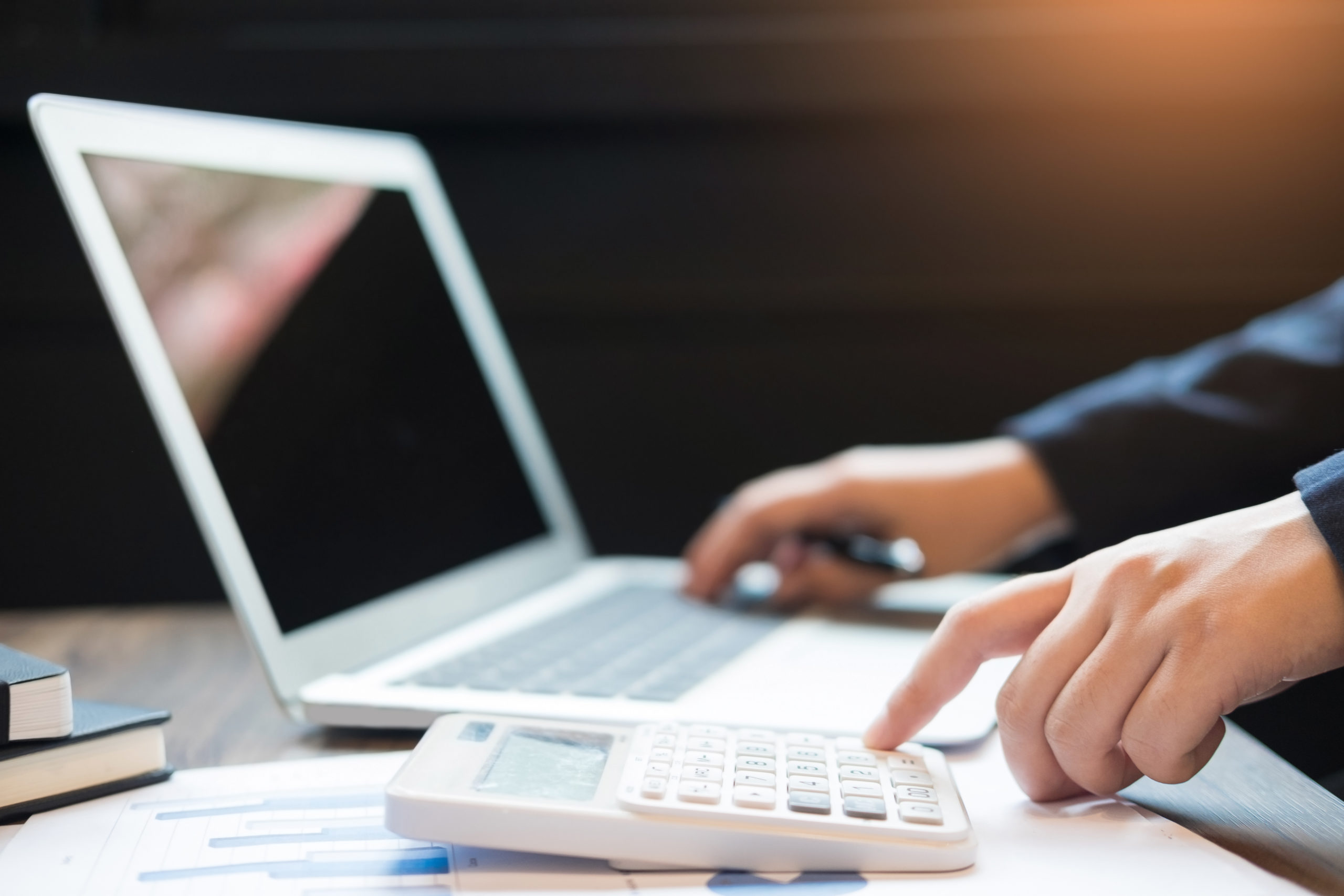 Administrator business man financial inspector and secretary making report, calculating balance. Internal Revenue Service checking document. Audit concept